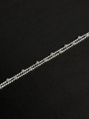 Pearl necklace on a black background