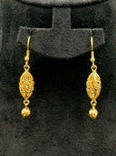 Close-up of the pair of hook drop earrings showing the open-lattice oval body with engraved leaf cutwork and faceted ball drop